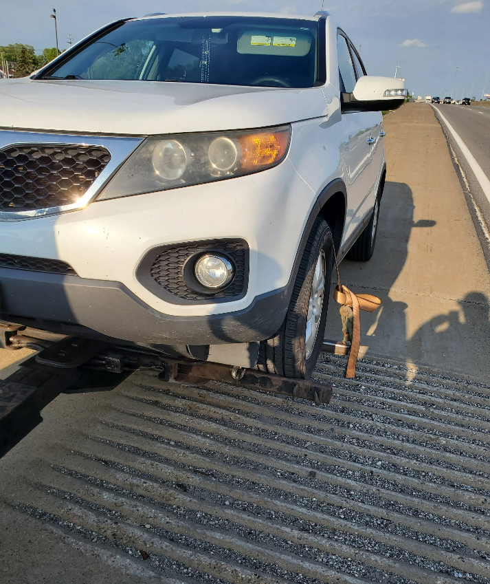 Recovery of a stranded vehicle on the highway