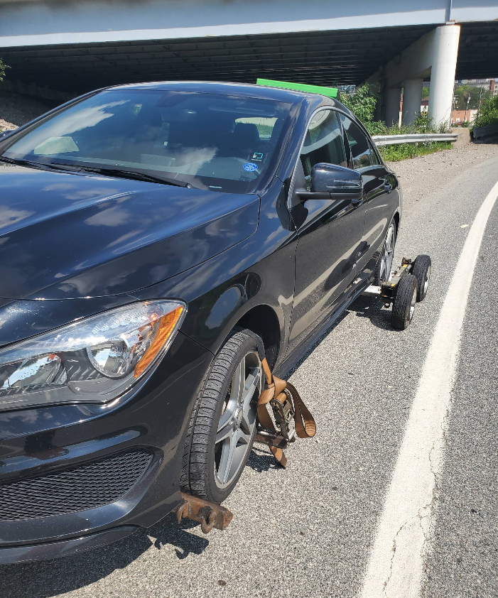 Flatbed recovery of a customer vehicle